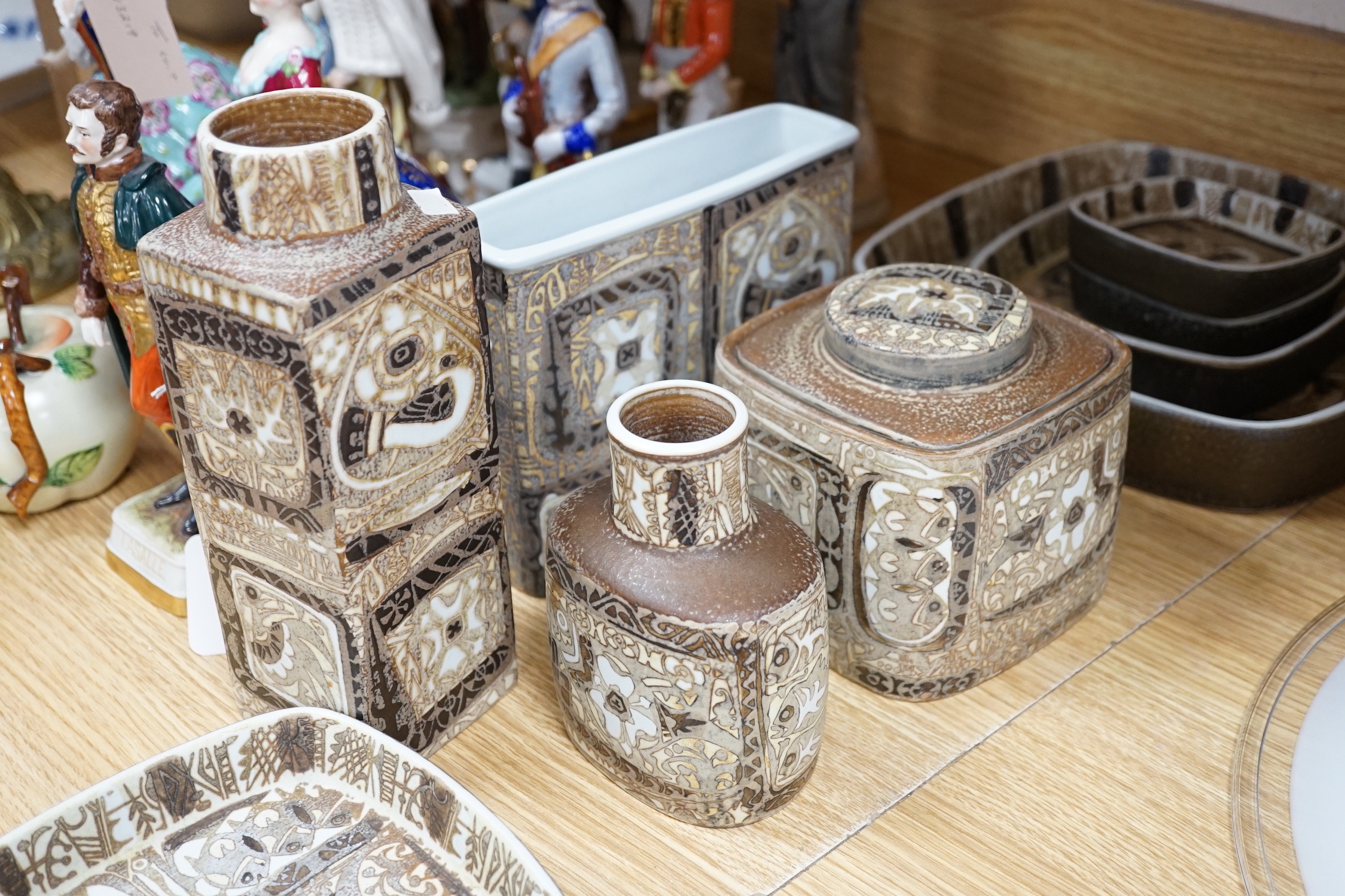 Nine Royal Copenhagen ceramic items by Nils Thorssen including; five, shallow, square section, dishes, a rectangular section vase, a square section vase, an oval section vase, and a lidded pot, tallest 22cm